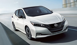 2024 Nissan LEAF in white on a highway daytime